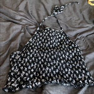 Black and white floral halter crop top.